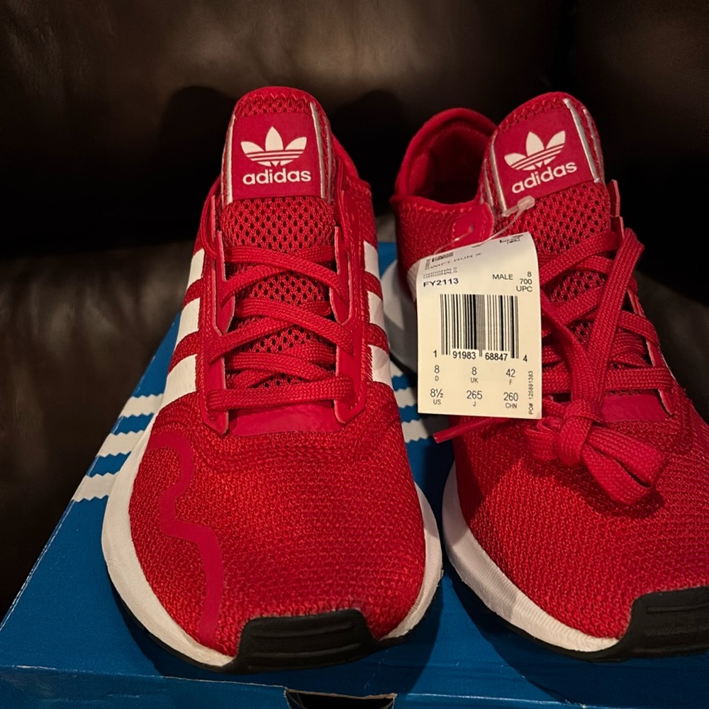 NIB with tags mens Adidas Swift Run X training shoes.